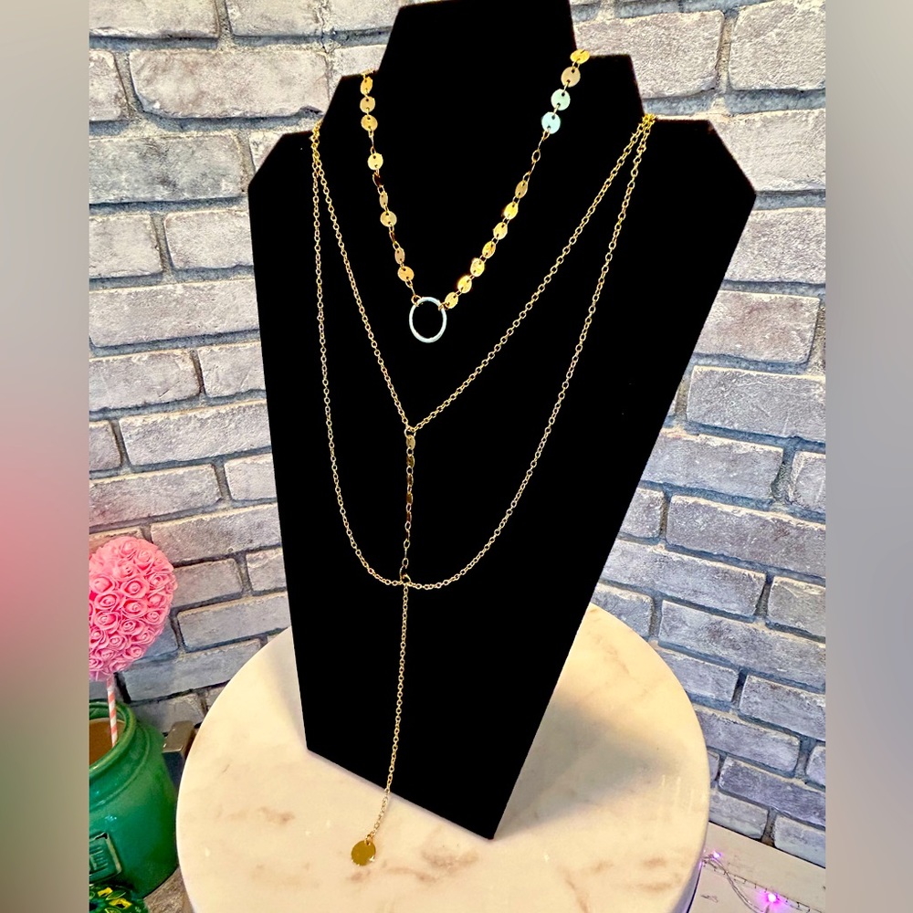 Park Lane multi layered gold necklace.